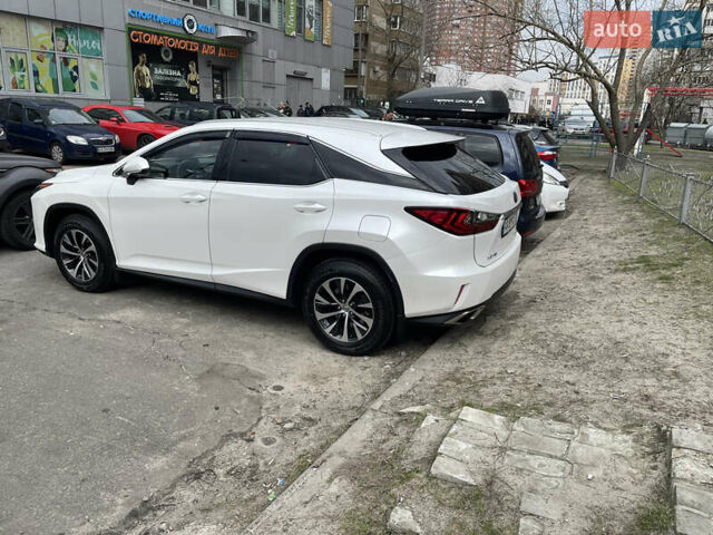 Білий Лексус РХ, об'ємом двигуна 2 л та пробігом 186 тис. км за 27777 $, фото 1 на Automoto.ua