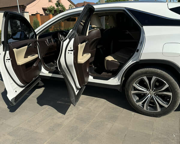 Белый Лексус РХ, объемом двигателя 2 л и пробегом 142 тыс. км за 31000 $, фото 3 на Automoto.ua