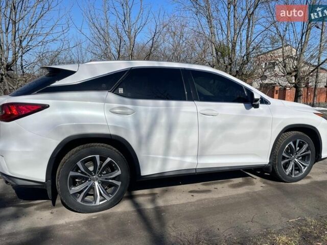 Белый Лексус РХ, объемом двигателя 2 л и пробегом 146 тыс. км за 27500 $, фото 3 на Automoto.ua