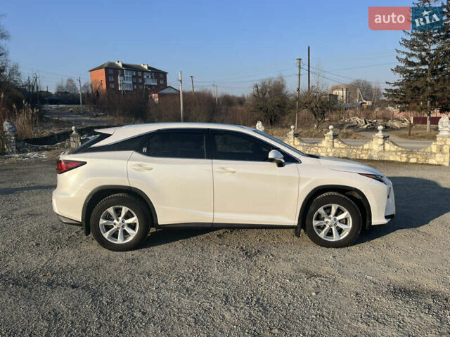 Білий Лексус РХ, об'ємом двигуна 2 л та пробігом 58 тис. км за 33800 $, фото 9 на Automoto.ua