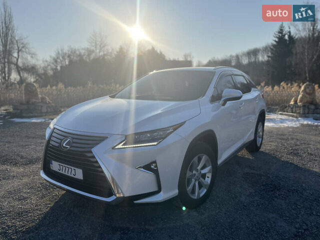 Білий Лексус РХ, об'ємом двигуна 2 л та пробігом 58 тис. км за 33800 $, фото 1 на Automoto.ua
