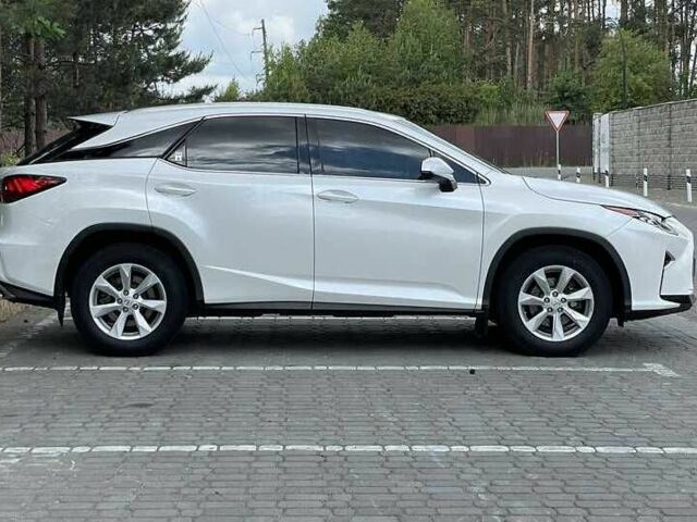 Білий Лексус РХ, об'ємом двигуна 2 л та пробігом 107 тис. км за 28000 $, фото 4 на Automoto.ua