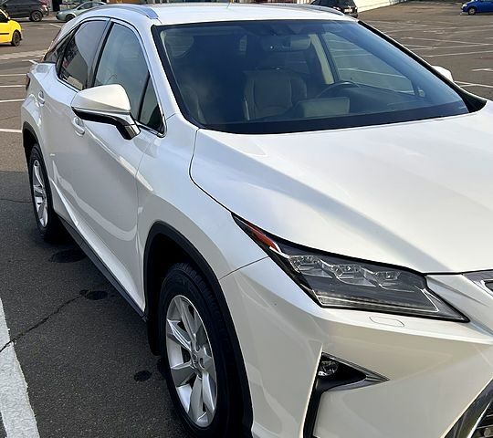 Белый Лексус РХ, объемом двигателя 2 л и пробегом 100 тыс. км за 31900 $, фото 1 на Automoto.ua