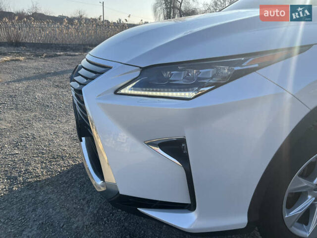 Білий Лексус РХ, об'ємом двигуна 2 л та пробігом 58 тис. км за 33800 $, фото 12 на Automoto.ua
