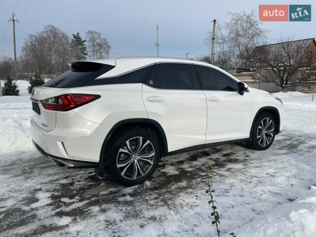 Білий Лексус РХ, об'ємом двигуна 2 л та пробігом 147 тис. км за 27700 $, фото 12 на Automoto.ua