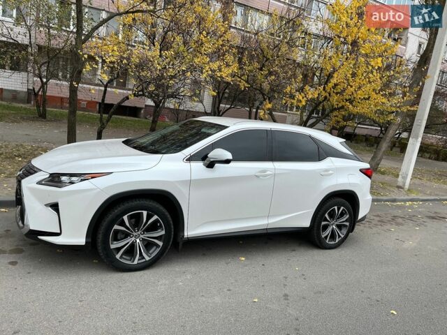 Білий Лексус РХ, об'ємом двигуна 2 л та пробігом 150 тис. км за 35500 $, фото 1 на Automoto.ua