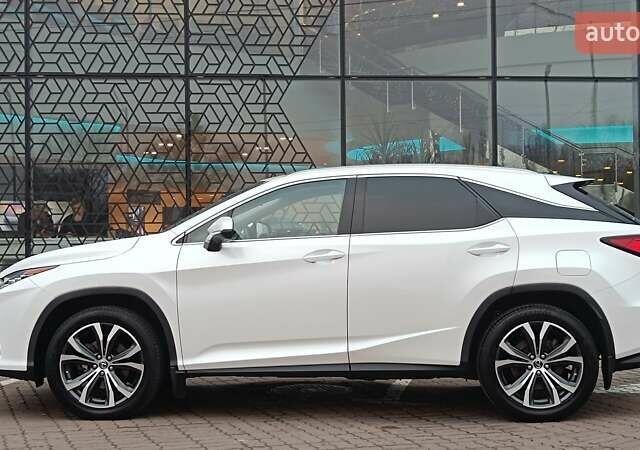 Белый Лексус РХ, объемом двигателя 2 л и пробегом 169 тыс. км за 29468 $, фото 2 на Automoto.ua