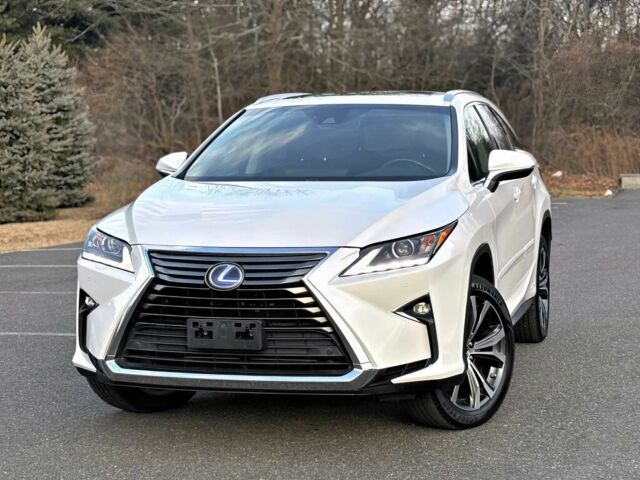 Белый Лексус РХ, объемом двигателя 3.5 л и пробегом 33 тыс. км за 30000 $, фото 2 на Automoto.ua