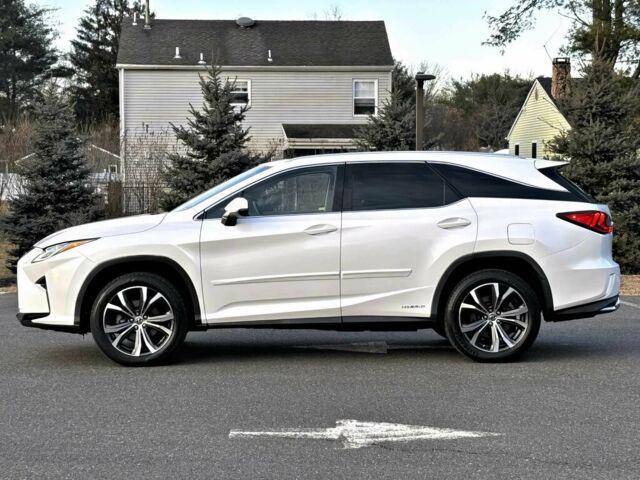 Белый Лексус РХ, объемом двигателя 3.5 л и пробегом 33 тыс. км за 30000 $, фото 3 на Automoto.ua