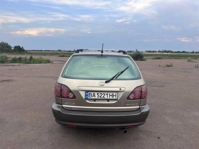 Бежевий Лексус РХ, об'ємом двигуна 3 л та пробігом 300 тис. км за 4995 $, фото 2 на Automoto.ua