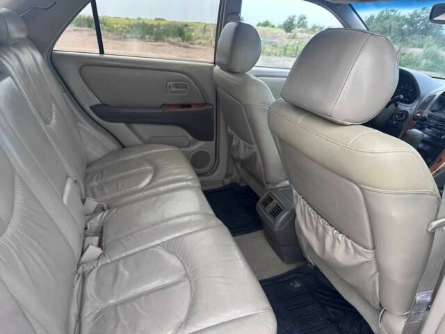 Бежевий Лексус РХ, об'ємом двигуна 3 л та пробігом 300 тис. км за 4995 $, фото 5 на Automoto.ua
