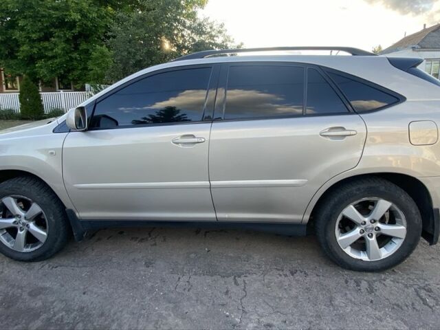 Бежевий Лексус РХ, об'ємом двигуна 3 л та пробігом 345 тис. км за 9000 $, фото 3 на Automoto.ua