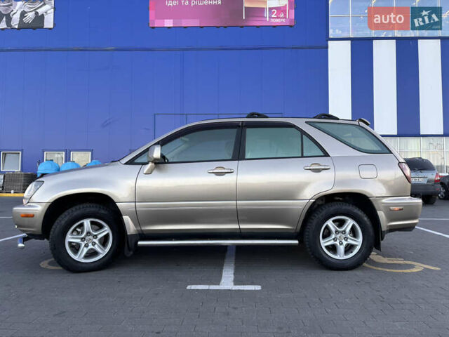 Бежевий Лексус РХ, об'ємом двигуна 3 л та пробігом 327 тис. км за 5700 $, фото 6 на Automoto.ua