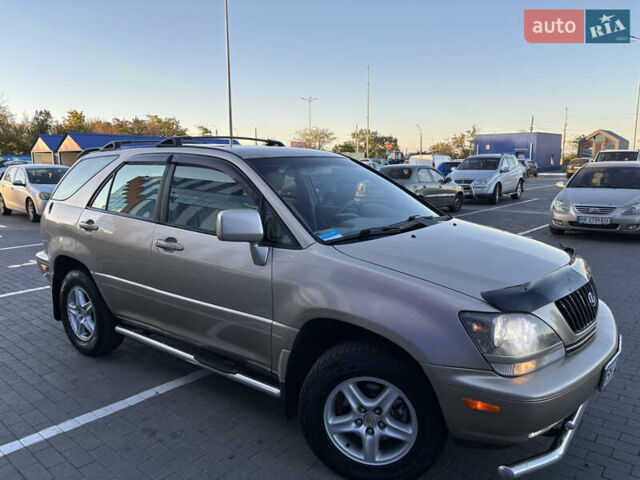 Бежевий Лексус РХ, об'ємом двигуна 3 л та пробігом 327 тис. км за 5700 $, фото 12 на Automoto.ua