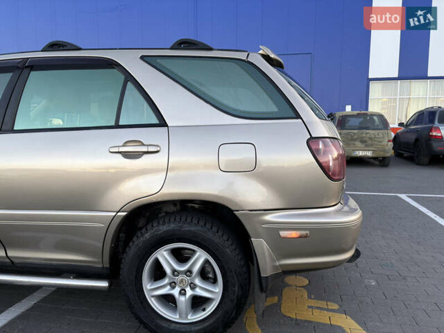 Бежевий Лексус РХ, об'ємом двигуна 3 л та пробігом 327 тис. км за 5700 $, фото 8 на Automoto.ua