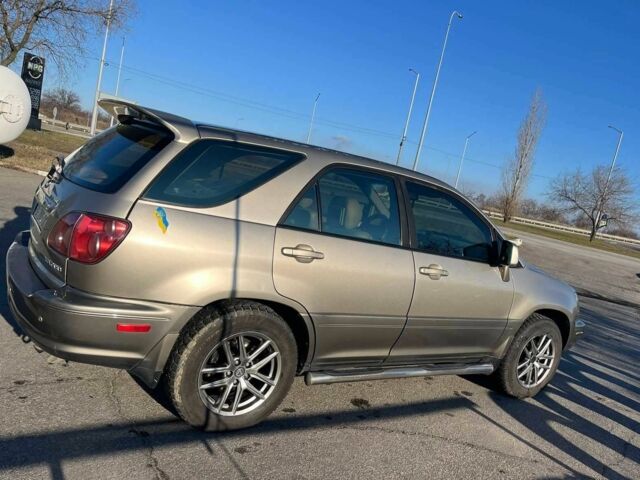 Бежевый Лексус РХ, объемом двигателя 3 л и пробегом 295 тыс. км за 5300 $, фото 2 на Automoto.ua