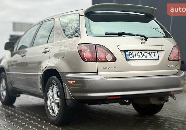 Бежевый Лексус РХ, объемом двигателя 3 л и пробегом 199 тыс. км за 6150 $, фото 11 на Automoto.ua