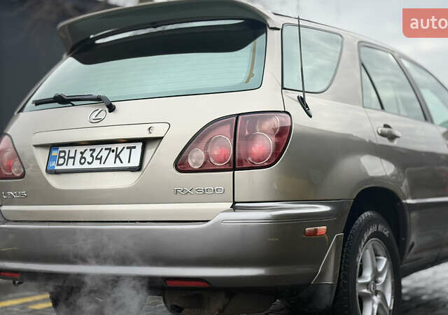 Бежевый Лексус РХ, объемом двигателя 3 л и пробегом 199 тыс. км за 6150 $, фото 20 на Automoto.ua