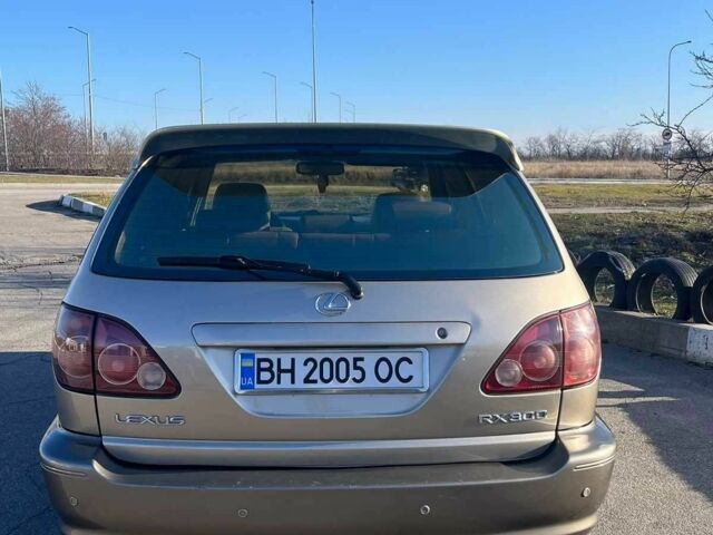 Бежевый Лексус РХ, объемом двигателя 3 л и пробегом 290 тыс. км за 6282 $, фото 1 на Automoto.ua