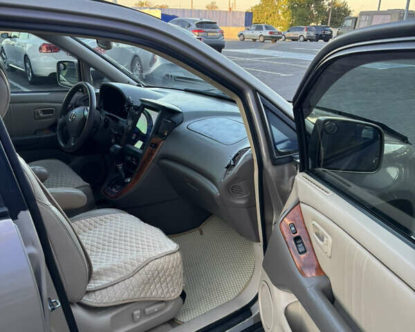 Бежевий Лексус РХ, об'ємом двигуна 3 л та пробігом 327 тис. км за 5700 $, фото 44 на Automoto.ua