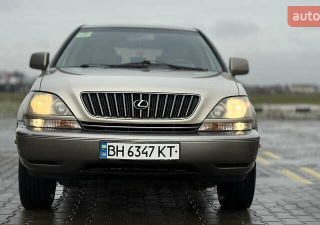 Бежевый Лексус РХ, объемом двигателя 3 л и пробегом 199 тыс. км за 6150 $, фото 2 на Automoto.ua