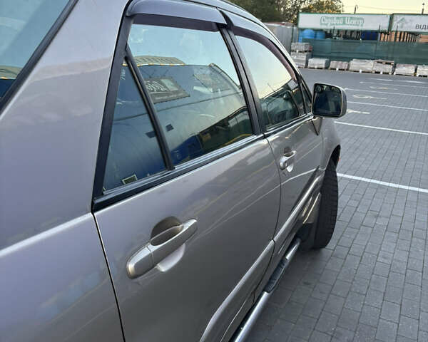 Бежевий Лексус РХ, об'ємом двигуна 3 л та пробігом 327 тис. км за 5700 $, фото 16 на Automoto.ua