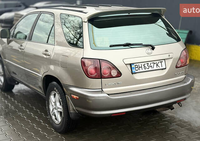 Бежевый Лексус РХ, объемом двигателя 3 л и пробегом 199 тыс. км за 6150 $, фото 12 на Automoto.ua