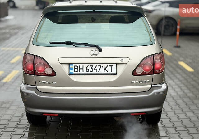 Бежевый Лексус РХ, объемом двигателя 3 л и пробегом 199 тыс. км за 6150 $, фото 16 на Automoto.ua