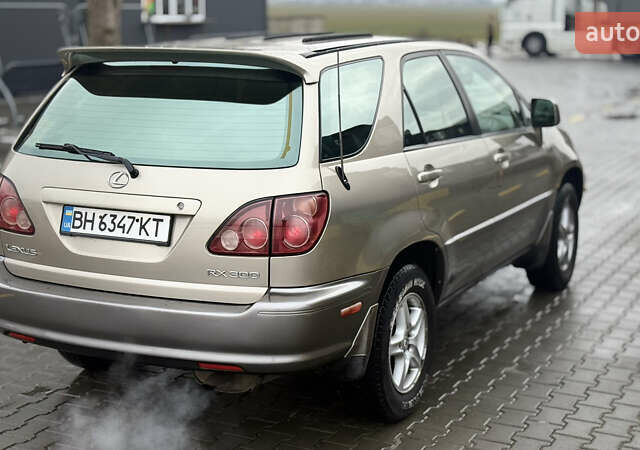 Бежевый Лексус РХ, объемом двигателя 3 л и пробегом 199 тыс. км за 6150 $, фото 18 на Automoto.ua