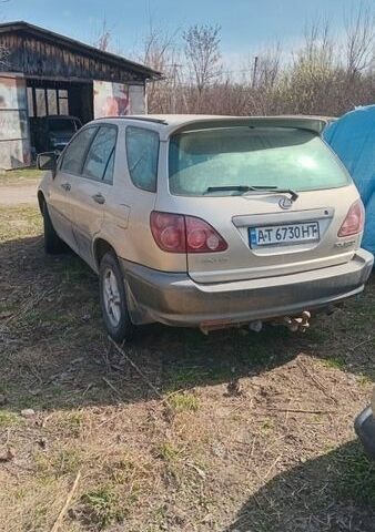 Бежевый Лексус РХ, объемом двигателя 3 л и пробегом 220 тыс. км за 4500 $, фото 2 на Automoto.ua