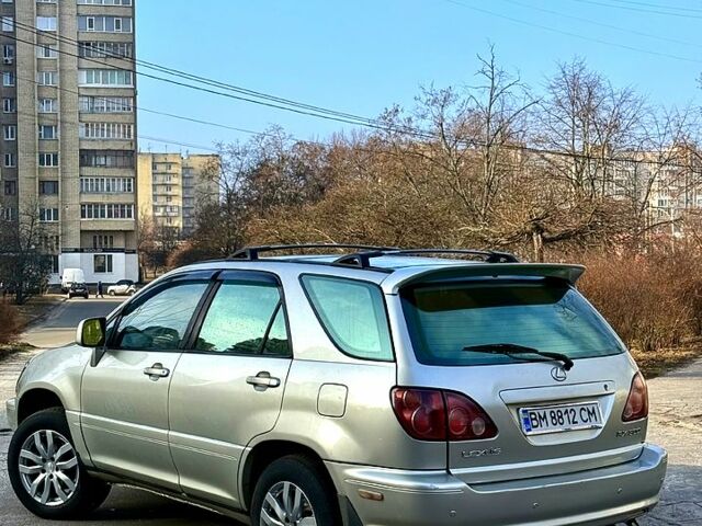 Бежевий Лексус РХ, об'ємом двигуна 3 л та пробігом 300 тис. км за 3900 $, фото 2 на Automoto.ua