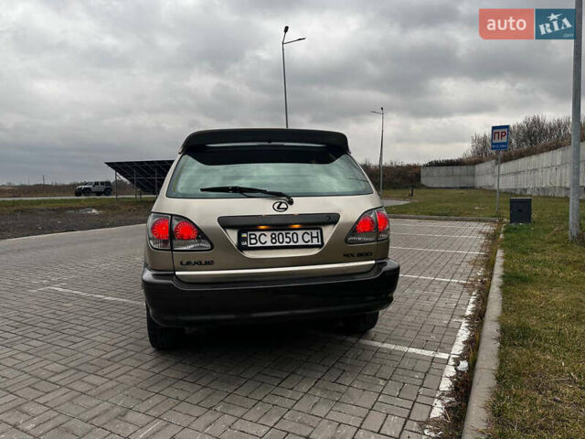 Бежевий Лексус РХ, об'ємом двигуна 3 л та пробігом 240 тис. км за 6700 $, фото 5 на Automoto.ua