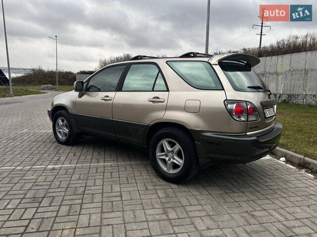 Бежевий Лексус РХ, об'ємом двигуна 3 л та пробігом 240 тис. км за 6700 $, фото 4 на Automoto.ua