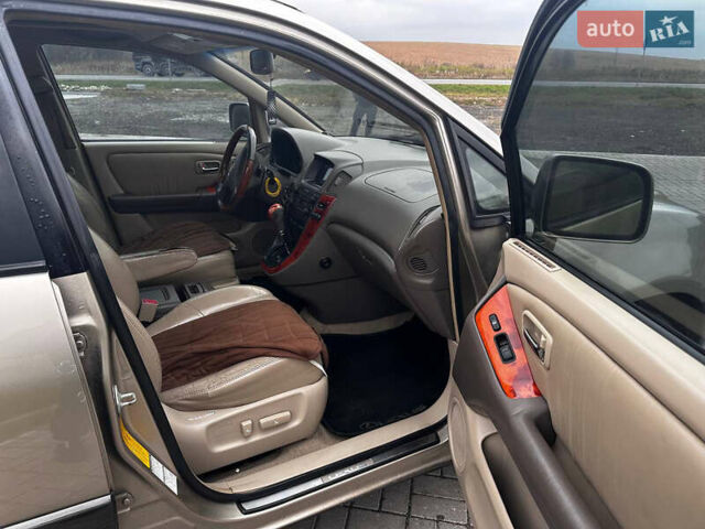 Бежевий Лексус РХ, об'ємом двигуна 3 л та пробігом 240 тис. км за 6700 $, фото 7 на Automoto.ua