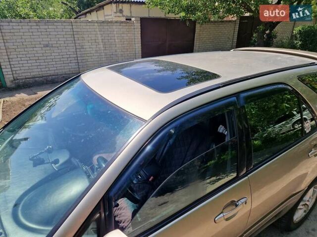 Бежевый Лексус РХ, объемом двигателя 3 л и пробегом 345 тыс. км за 5500 $, фото 1 на Automoto.ua