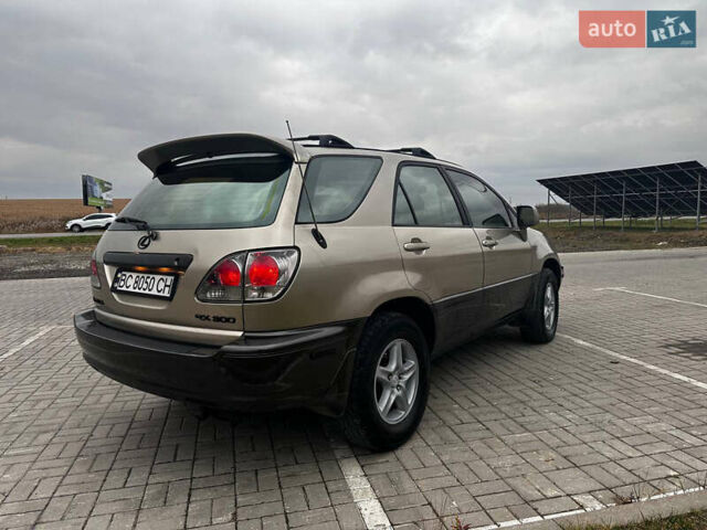 Бежевий Лексус РХ, об'ємом двигуна 3 л та пробігом 240 тис. км за 6700 $, фото 6 на Automoto.ua