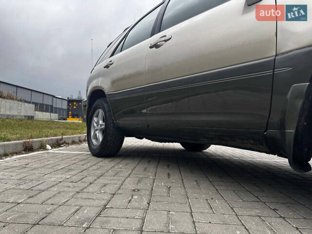 Бежевий Лексус РХ, об'ємом двигуна 3 л та пробігом 240 тис. км за 6700 $, фото 17 на Automoto.ua