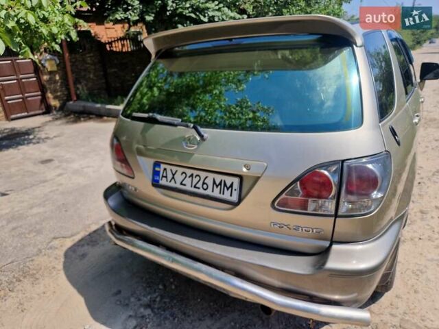 Бежевый Лексус РХ, объемом двигателя 3 л и пробегом 345 тыс. км за 5500 $, фото 5 на Automoto.ua