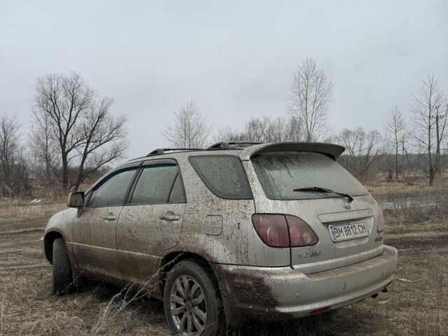 Бежевый Лексус РХ, объемом двигателя 3 л и пробегом 305 тыс. км за 4400 $, фото 3 на Automoto.ua