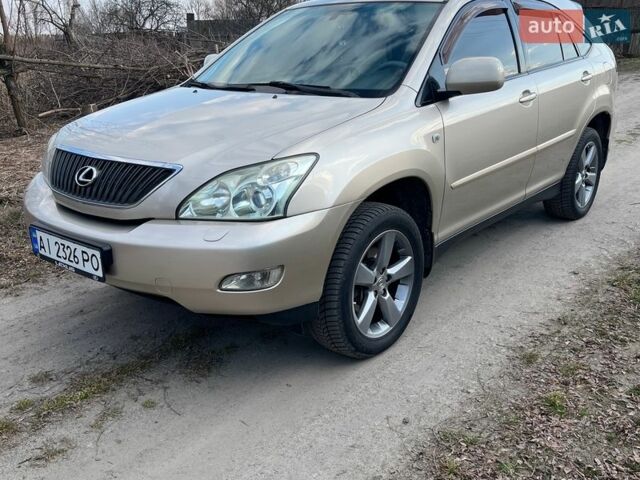 Бежевый Лексус РХ, объемом двигателя 3.3 л и пробегом 286 тыс. км за 10300 $, фото 1 на Automoto.ua