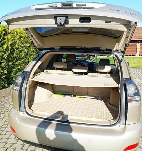 Бежевый Лексус РХ, объемом двигателя 3.3 л и пробегом 256 тыс. км за 8500 $, фото 1 на Automoto.ua