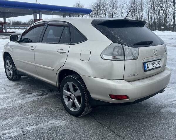 Бежевый Лексус РХ, объемом двигателя 3.31 л и пробегом 280 тыс. км за 10800 $, фото 5 на Automoto.ua