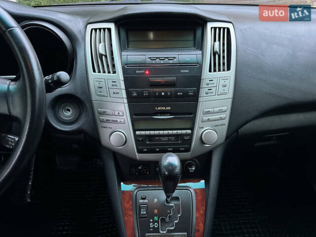 Бежевый Лексус РХ, объемом двигателя 3 л и пробегом 192 тыс. км за 10750 $, фото 17 на Automoto.ua