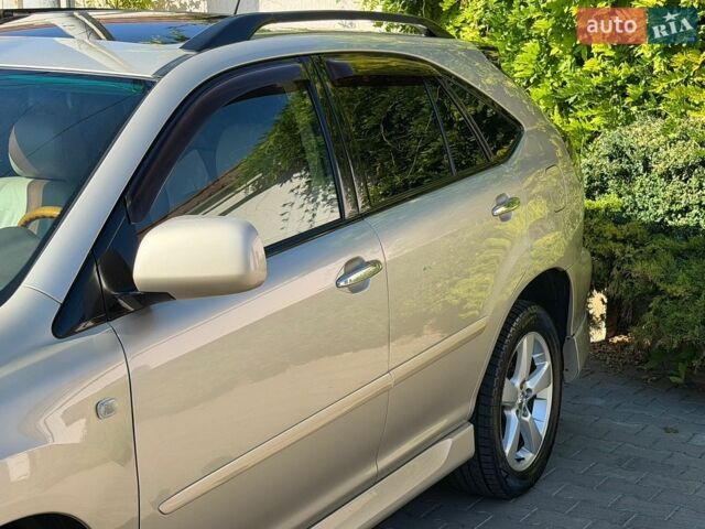 Бежевий Лексус РХ, об'ємом двигуна 3.46 л та пробігом 170 тис. км за 9300 $, фото 66 на Automoto.ua