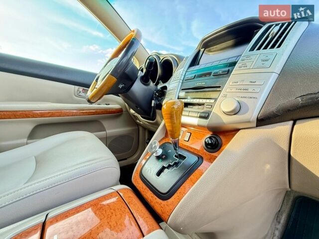 Бежевый Лексус РХ, объемом двигателя 3.3 л и пробегом 240 тыс. км за 7800 $, фото 78 на Automoto.ua
