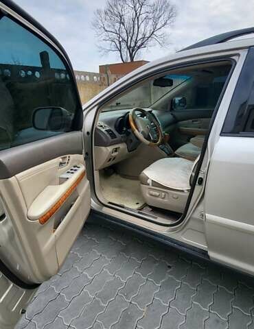 Бежевий Лексус РХ, об'ємом двигуна 3.46 л та пробігом 298 тис. км за 10500 $, фото 2 на Automoto.ua