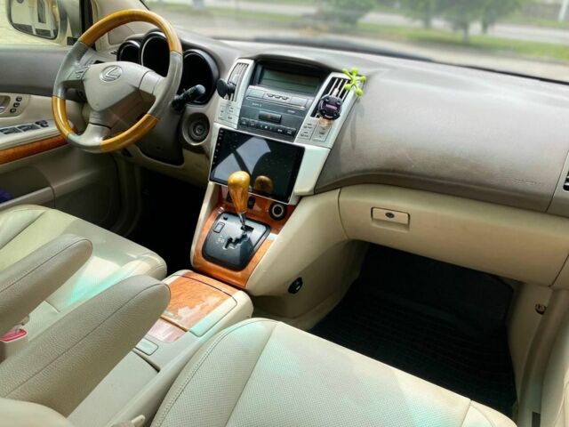 Бежевый Лексус РХ, объемом двигателя 3.5 л и пробегом 254 тыс. км за 8650 $, фото 1 на Automoto.ua