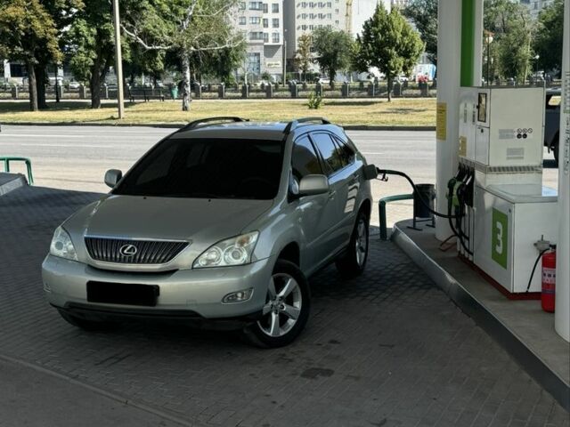 Бежевий Лексус РХ, об'ємом двигуна 3 л та пробігом 408 тис. км за 6704 $, фото 1 на Automoto.ua