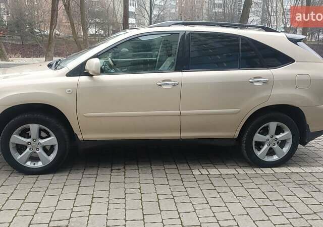 Бежевый Лексус РХ, объемом двигателя 3.46 л и пробегом 246 тыс. км за 11200 $, фото 2 на Automoto.ua