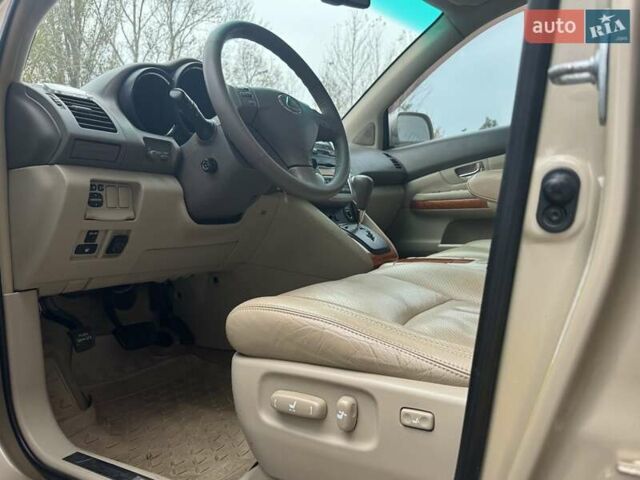 Бежевый Лексус РХ, объемом двигателя 3.46 л и пробегом 228 тыс. км за 10900 $, фото 85 на Automoto.ua